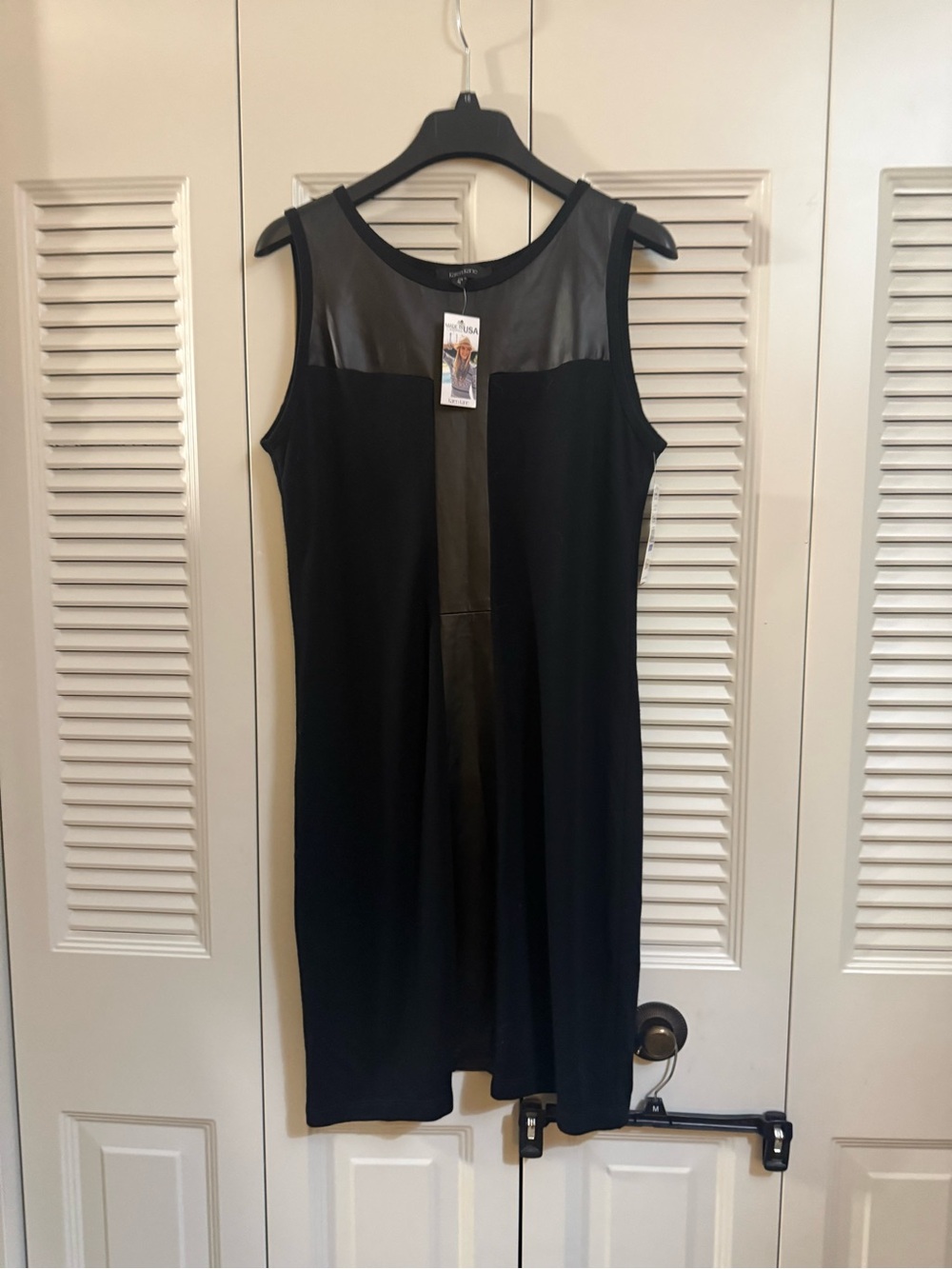 Sleeveless Black Sheath Dress with faux leather trim